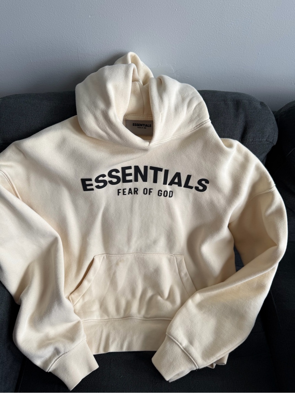 Fear of God Essentials Hoodie in Cream with Black Logo